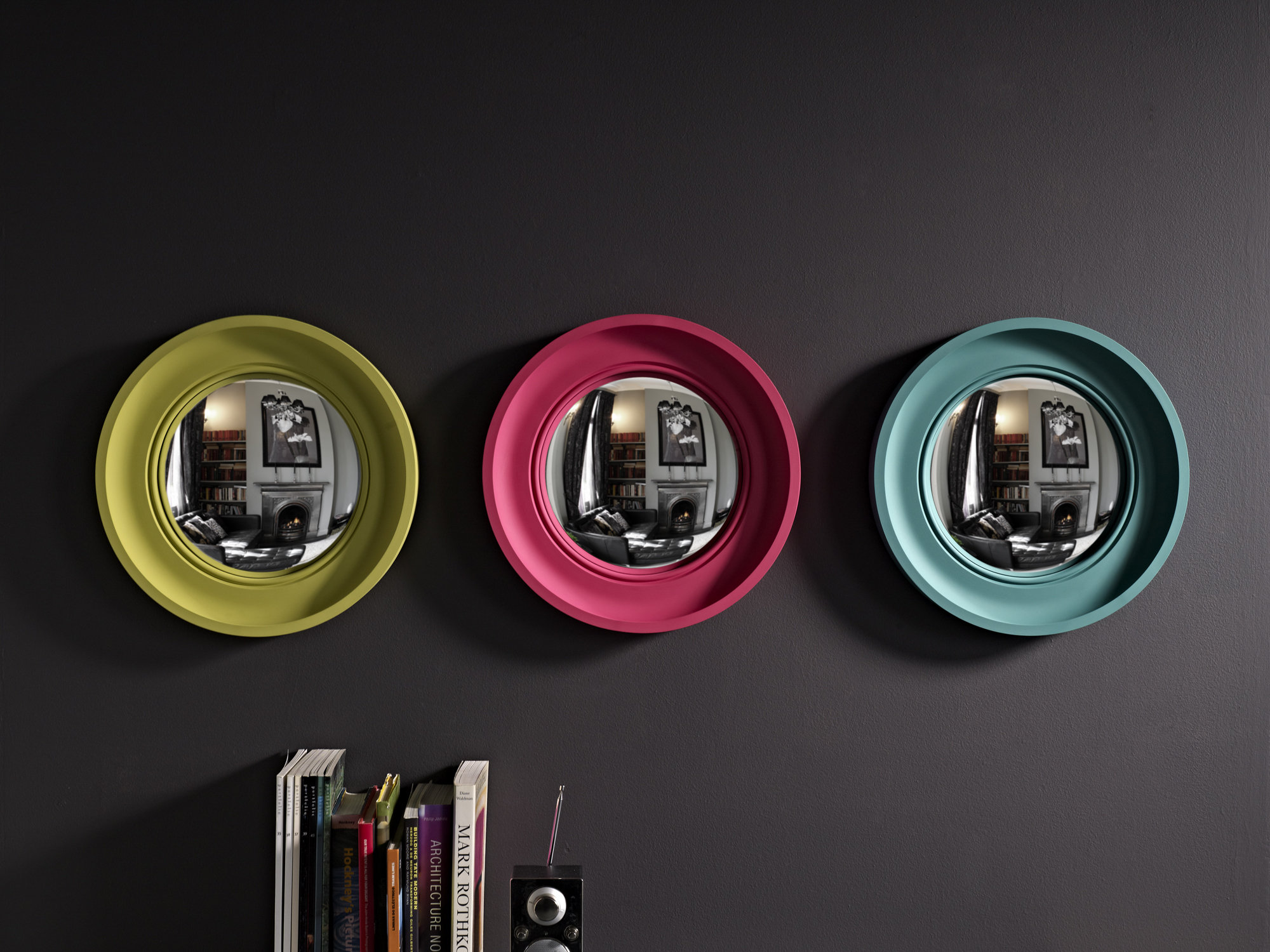 Small Cavetto round convex mirrors, in palest lime, fuchsia & teal
