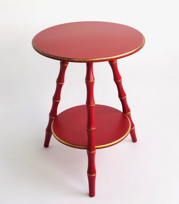 faux bamboo side table in red painted finish image